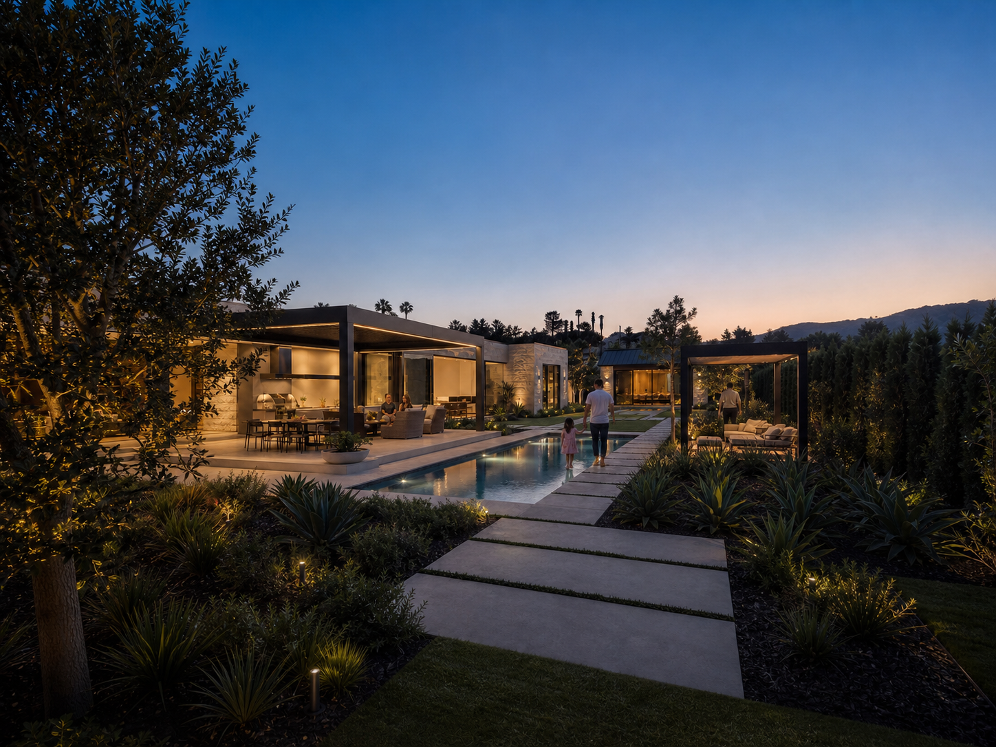 A pool and landscaped path connecting the main residence to a freestanding pavilion and garden residence