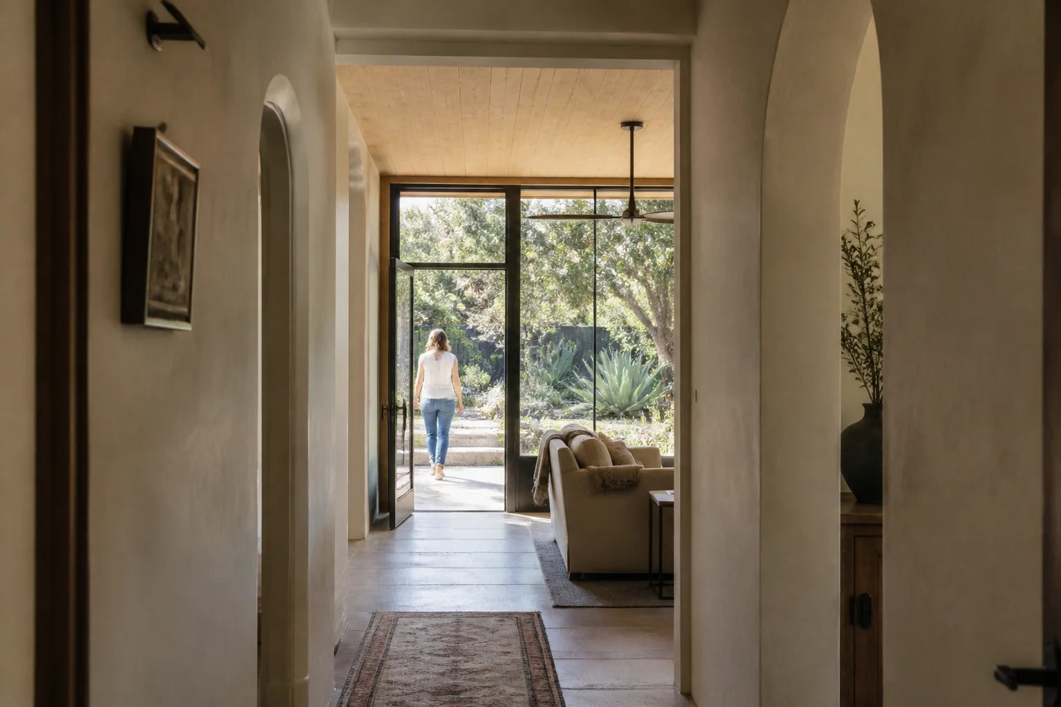 A clear route from the existing home through a new family room to the garden